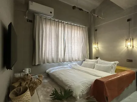 Shitian Homestay Отели в г. Тунхай