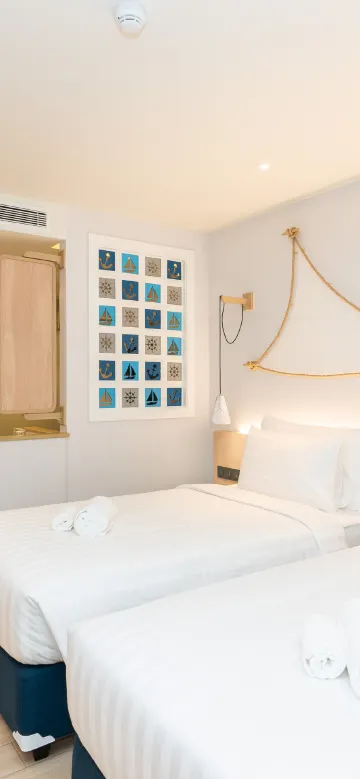 ห้องดีลักซ์เตียงแฝดวิวต้นไม้