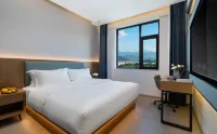 Yueju Hotel (Mangshi Airport Fortune Plaza) Hotel in zona China Burma Friendship Tree