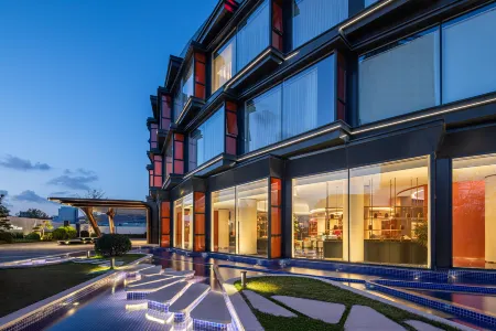 Movenpick by Accor Qingdao Sunmei Отели рядом с достопримечательностью «Tangdao Bay Coastal Park»