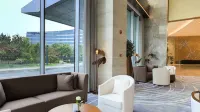 Grand Barony Qingdao Airport Hotel - С тренажерным залом