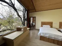 Huangyao Yuanquanju Chinese Inn (Qianxing Plaza) - บริการรถรับส่ง