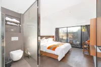 Shangpin rongxi Apartment (Plaza Gaoqi Airport Branch) - Inns