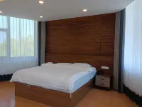 Qiqihar China Yizhong Hotel Hotel in zona Hong'an Stadium