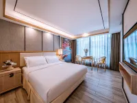 Lijiang ancient city Zangyuan snow mountain view hotel (big water wheel shop) فنادق في ليجيانغ