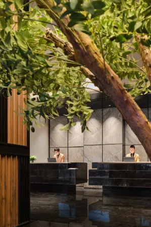 Chengdu City Memory Hotel (Shuangliu Airport Outlets Store) Отели рядом с достопримечательностью «Jiaolonggang Zhanshi Center»