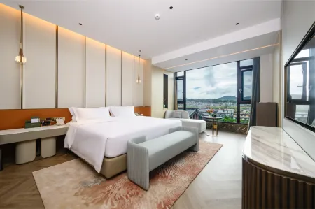 Pu'er Jianhua International Hotel Отели рядом с достопримечательностью «Shiji Square»