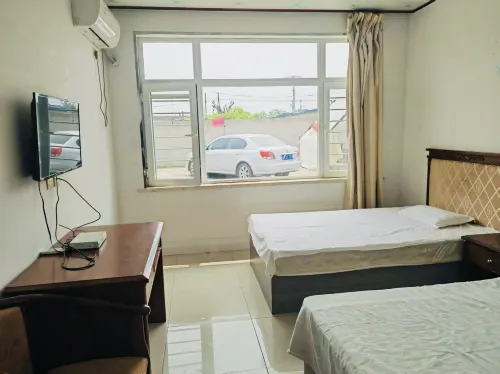 Baisha Bay Xianghe Homestay - Beach