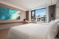 Junyi Resort Hotel (Lingshui High-speed Railway Station Haiyun Plaza Branch) - Haustierfreundliche