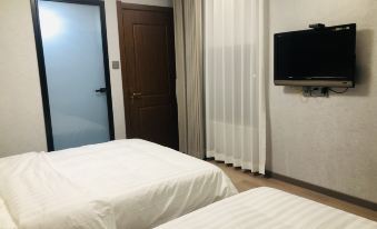 Longzhiyue Homestay (Dongguanjie Meishiguangchang)