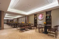 Huayi Jinxin Hotel - servizio colazione