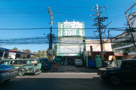 RedDoorz @ Ranchotel Alabang Отели в г. Мунтинлупа