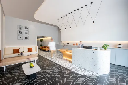 baseLITE TONGFENG Serviced Apartment Отели рядом с достопримечательностью «Shanghai Institute for Youth Administration»