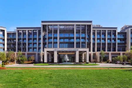 Wanda Vista   Changchun International Movie Metropolis Отели рядом с достопримечательностью «Yatai New City Hotel - Swimming Pool»