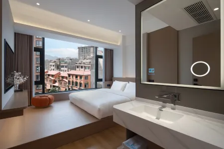 Xiangyun Manyue Valley Smart Selection Hotel Отели рядом с достопримечательностью «Xianghe Square»