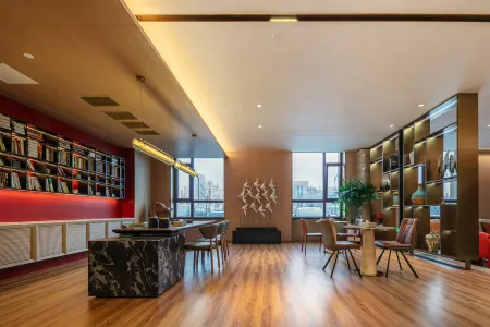 Rezan Realm LifeHotel (Harbin Ice and Snow World Store) Отели рядом с достопримечательностью «Heilongjiang Infotech Profession College (Xueyuan Road)»