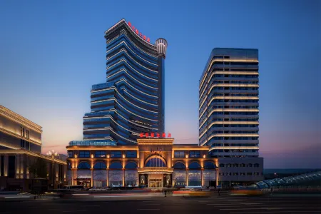 New Paris Hotel Отели рядом с достопримечательностью «Harbin Huaxia Institute of Computer Technology (Qianshan Road)»