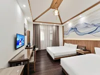 Juntang Meishu Hotel (Guangyang Xinboda Department Store, Huanghe Avenue, Yuanyang) Отели в г. Юаньян