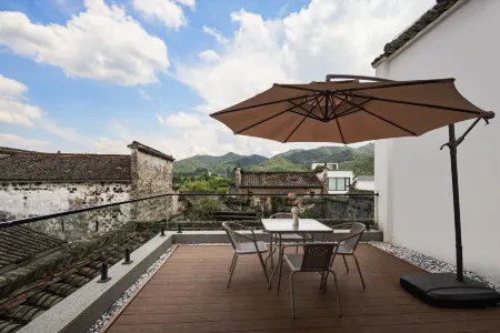 YantianResorts Отели рядом с достопримечательностью «Guzhang Folklore Garden»