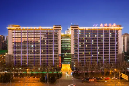 Qiangang Hotel Отели в г. Цянань