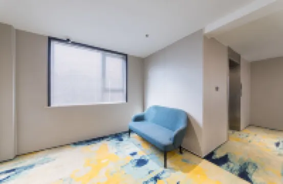 Wozhou Yueju Hotel (Xinchang Wanda Plaza)