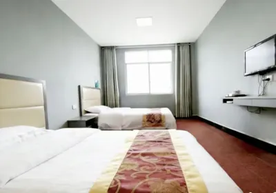 Qianyu Business Hotel (Enshi Railway Station) فنادق في 