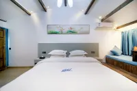 Huayang Nianhua Homestay (Lijiang Ancient City Branch) - موقف سيارات