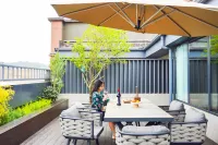 Dongjie Hotel (Chengdu University Games Sports Center Wanda Plaza) Hotel in zona CPC Chengdu Longquanyi District Committee Party School