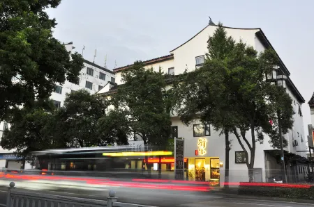 Xingle Hotel (Suzhou Guanqian Street Pingjiang Road)