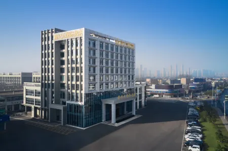 Wuwei New Era International Hotel Отели рядом со станцией Wuwei Railway Station