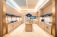 Huating Hotel (Yuanjiang Bus Station Qixiashan Wenquan)