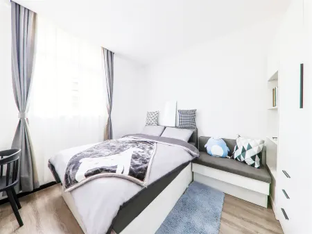 CJIA Serviced Apartment (Shanghai Zhongtan Road Subway Station) Отели рядом с достопримечательностью «Shanghai University of Engineering Science (Xincun Road)»