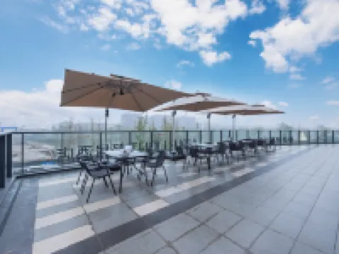 Cixi Sports Center Xinhefang Light Residence Hotel Hoteles en Cixi