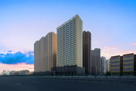 Madison Hotel Heze Wanda Plaza Отели рядом с достопримечательностью «Heze University North Campus»