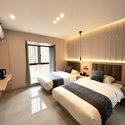 Yijian Homestay (Kunming Railway Station) Отели рядом с достопримечательностью «Железнодорожный вокзал Куньмин»