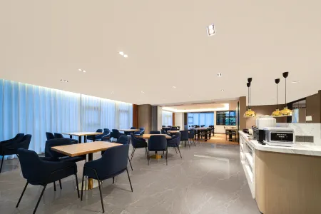 Ningbo Happy Coast Q-Box Hotel (Yinzhou Wanda Plaza) Отели рядом с достопримечательностью «The University of Nottingham Ningbo»