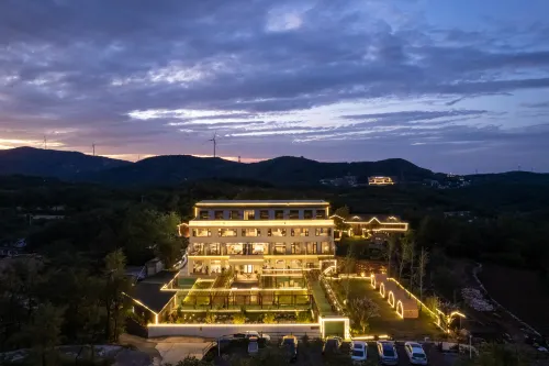 QIANNA HOTEL GLORIOUS (Fuxi Mountain Guogongling)