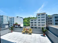 Lichuan Huashijian Homestay (Baicheng Railway Station) Отели в г. Личуань