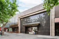 歡之明麗呈飯店（鄭州燕莊地鐵站曼哈頓廣場店） 鄭州市動物園附近的飯店