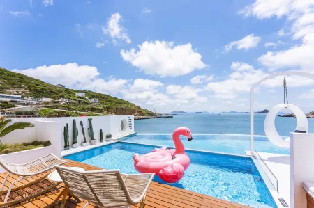 Shengsi Flower and Bird Island Alice Flower Island Whale House Отели в г. Шэнси