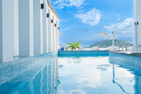 Floral Hotel·First sight·Rainbow Island Hotel Отели рядом с достопримечательностью «Zhili Ancient Village»