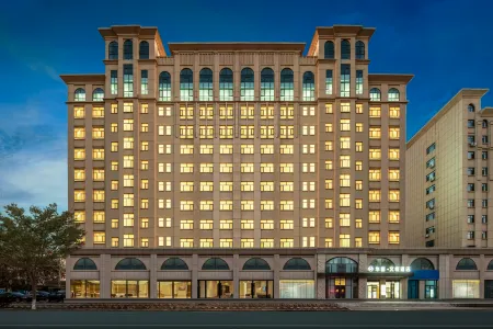 Huaji Wenyue Hotel (Weifang Minzhu Street North High-speed Railway Station) Отели рядом с достопримечательностью «Weichai University»