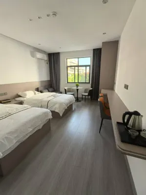 Juxian Hotel Hotels near Wannanmuzha Museum
