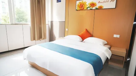 An yue juxin building business hotel Отели рядом с достопримечательностью «Anyue Stone Carvings»