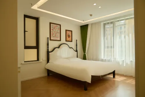 Yesijia (Yining Wanrong Plaza) - Holiday Apartments