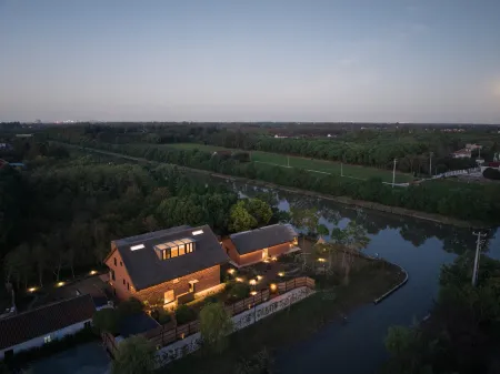 SOMLAND CHONGMING Отели рядом с достопримечательностью «Xisha Wetland»