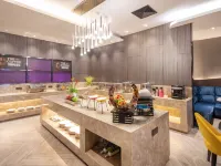 Huaju Hotel (Wenfeng World Store, Middle Jianghai Road, Qidong) Hoteles en Qidong