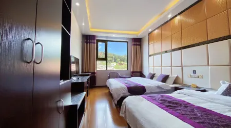 Langmusi Dingding Hotel Отели в г. Луцюй