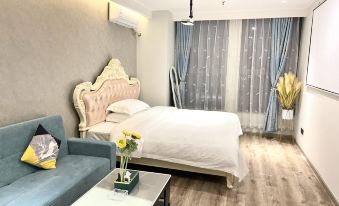 Baxi Homestay(Huaihua South Station Wanda Store)