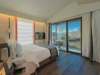 Nalati Nianhuawan Hayinsai Resort Hotel Hotéis em Condado de Xinyuan